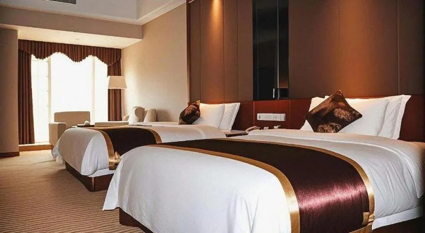 Bed in Jinggangshan ZhongTaiLai International Hotel