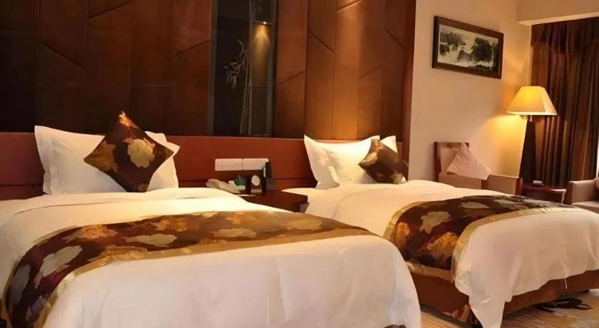 Bed in Jinggangshan ZhongTaiLai International Hotel