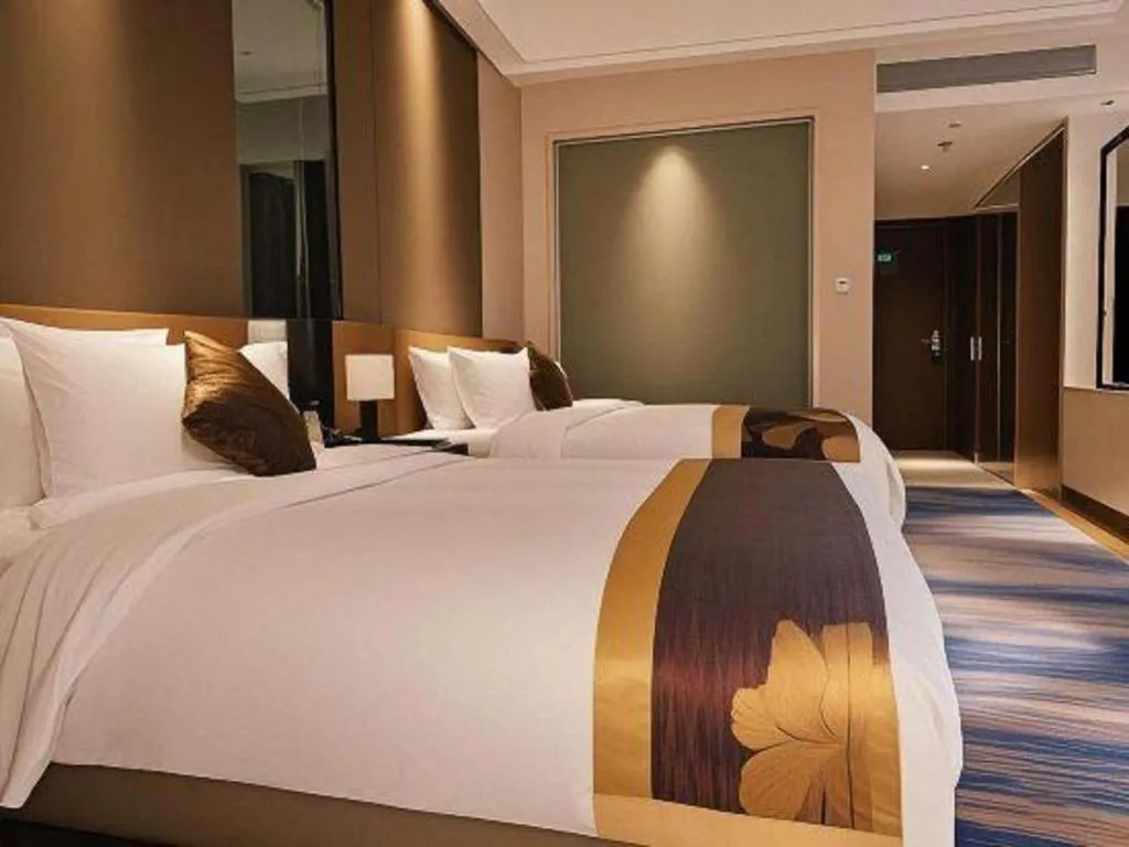 Bed in Jinggangshan ZhongTaiLai International Hotel