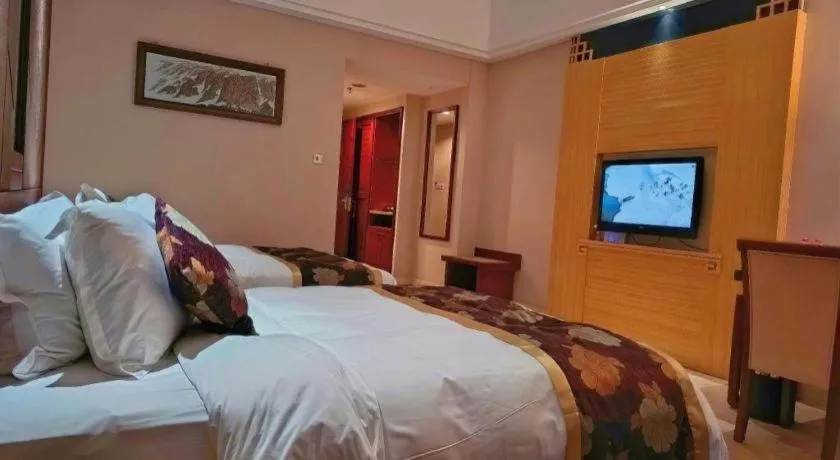 Bed in Jinggangshan ZhongTaiLai International Hotel