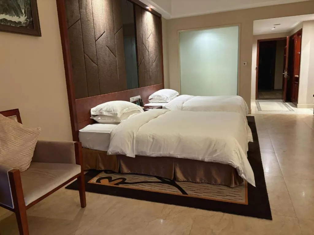 Bed in Jinggangshan ZhongTaiLai International Hotel