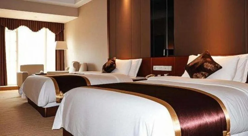 Bed in Jinggangshan ZhongTaiLai International Hotel