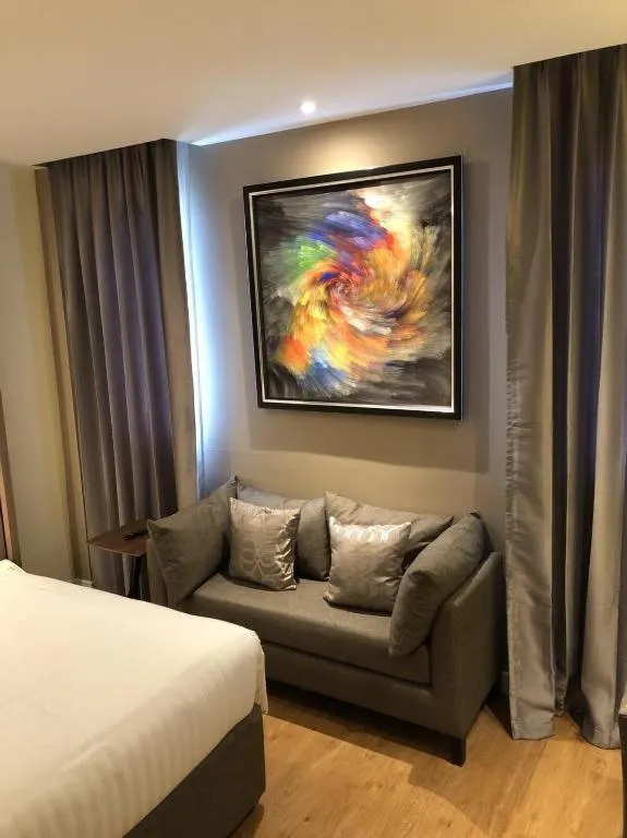 Bed in Sri U-Thong Grand Hotel