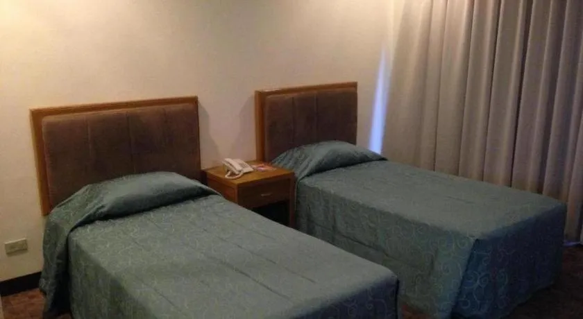 Bed in Bayfront Hotel Subic