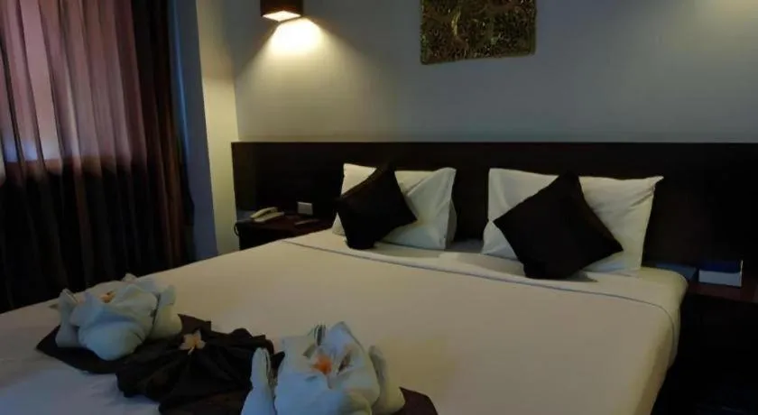 Bed in The Ligor City Hotel