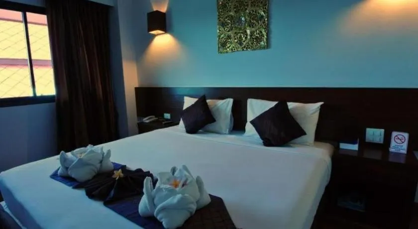 Bed in The Ligor City Hotel