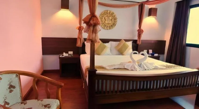 Bed in The Ligor City Hotel