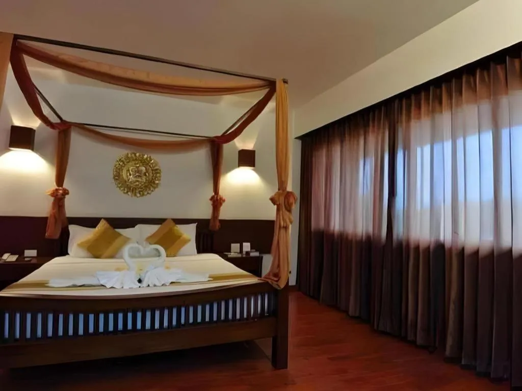 Bed in The Ligor City Hotel