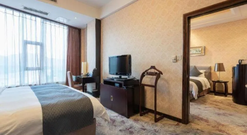 Bed in Jiande Peninsula Kaihao Hotel