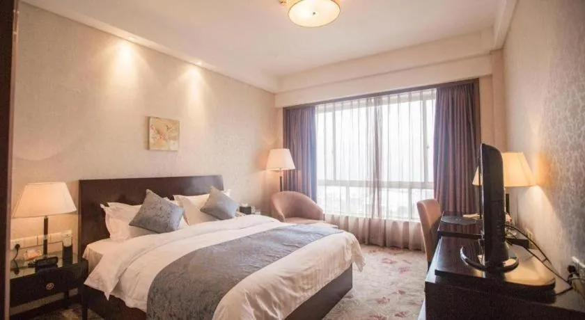 Bed in Jiande Peninsula Kaihao Hotel