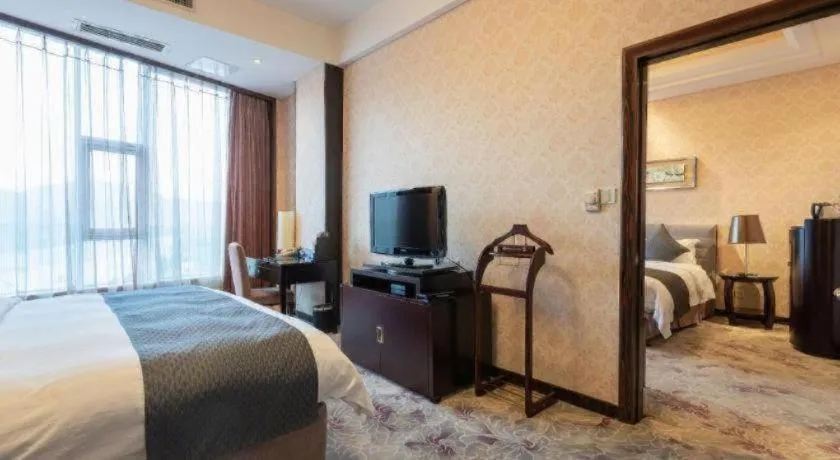 Bed in Jiande Peninsula Kaihao Hotel