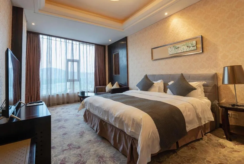 Bed in Jiande Peninsula Kaihao Hotel