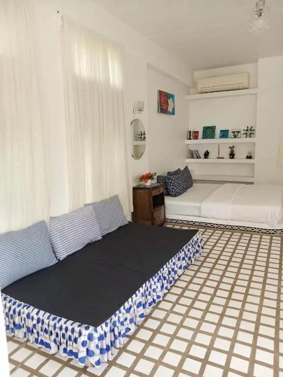 Bed in Brassiere Beach Hotel