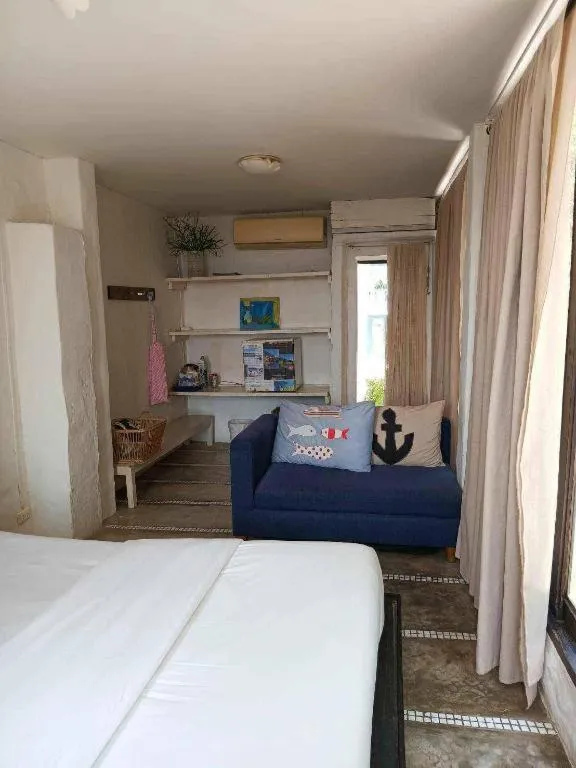 Bed in Brassiere Beach Hotel