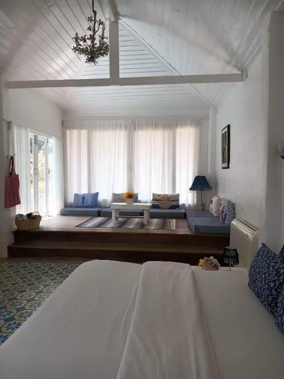 Bed in Brassiere Beach Hotel