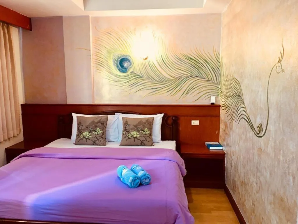 Bed in Loei Orchid Hotel