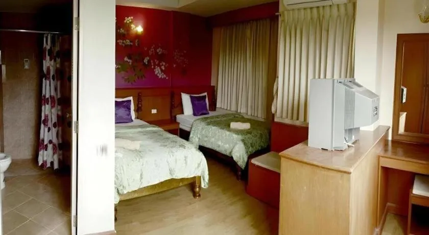 Bed in Loei Orchid Hotel