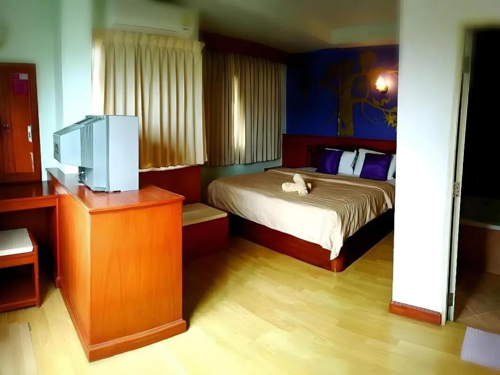 Bed in Loei Orchid Hotel
