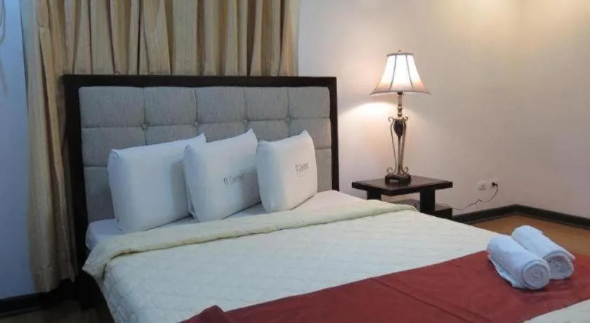 Bed in D' Leonor Hotel