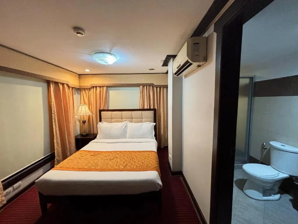 Bed in D' Leonor Hotel