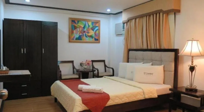 Bed in D' Leonor Hotel