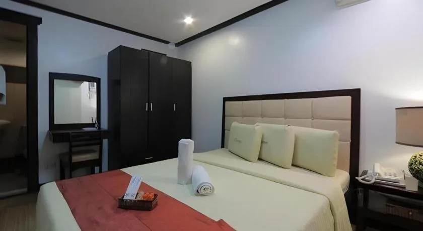 Bed in D' Leonor Hotel