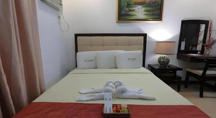 Bed in D' Leonor Hotel