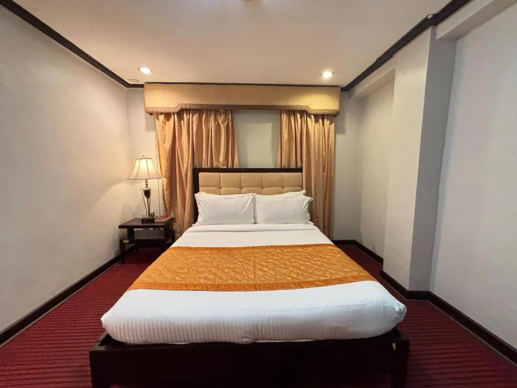 Bed in D' Leonor Hotel