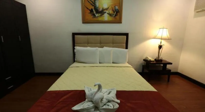 Bed in D' Leonor Hotel