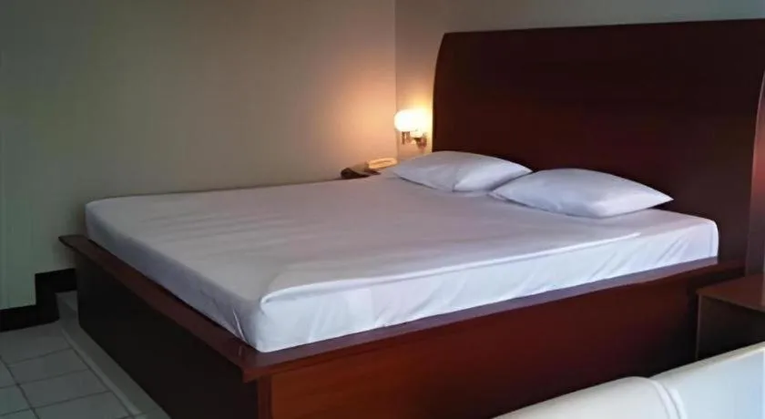 Bed in Hotel Minahasa
