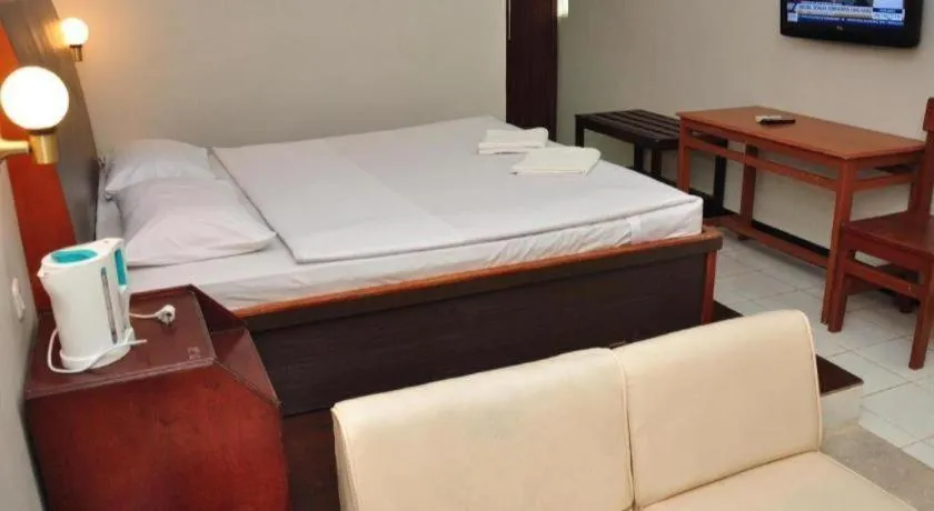 Bed in Hotel Minahasa