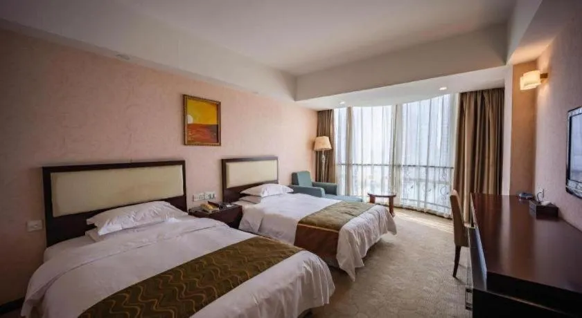 Bed in Wuhan Newport International Hotel