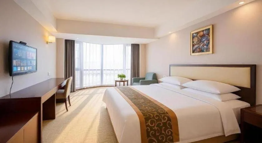 Bed in Wuhan Newport International Hotel