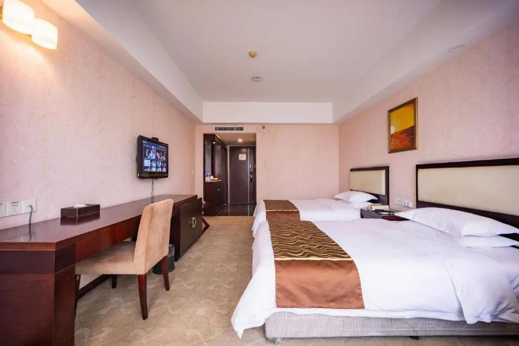 Bed in Wuhan Newport International Hotel