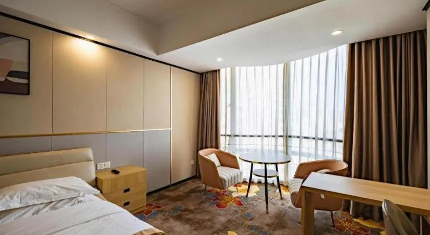 Bed in Wuhan Newport International Hotel