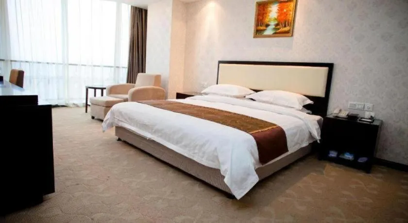 Bed in Wuhan Newport International Hotel