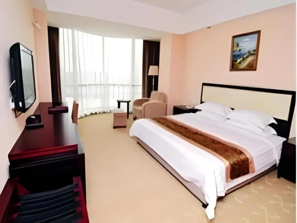 Bed in Wuhan Newport International Hotel