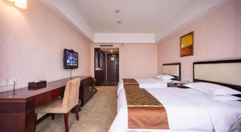 Bed in Wuhan Newport International Hotel