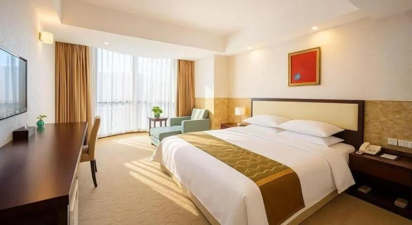 Bed in Wuhan Newport International Hotel