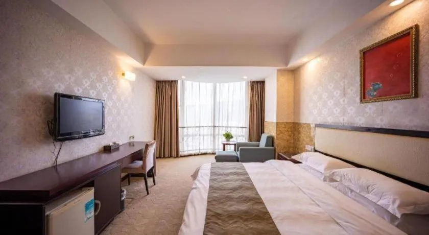 Bed in Wuhan Newport International Hotel