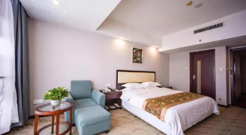 Bed in Wuhan Newport International Hotel