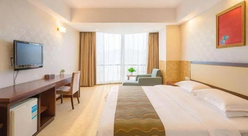 Bed in Wuhan Newport International Hotel