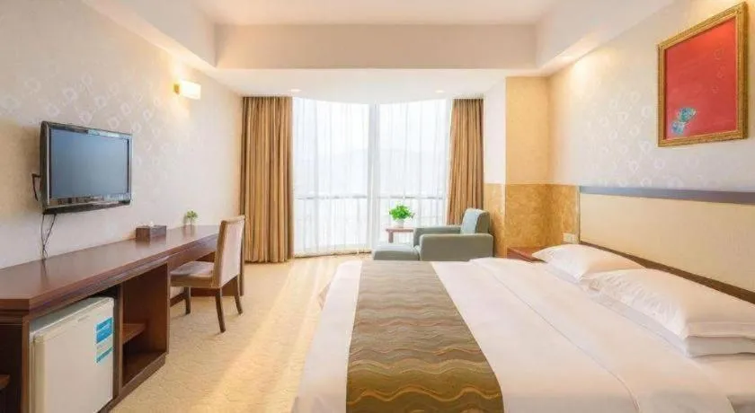 Bed in Wuhan Newport International Hotel