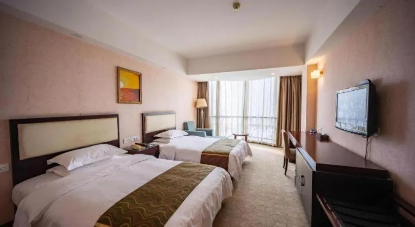 Bed in Wuhan Newport International Hotel