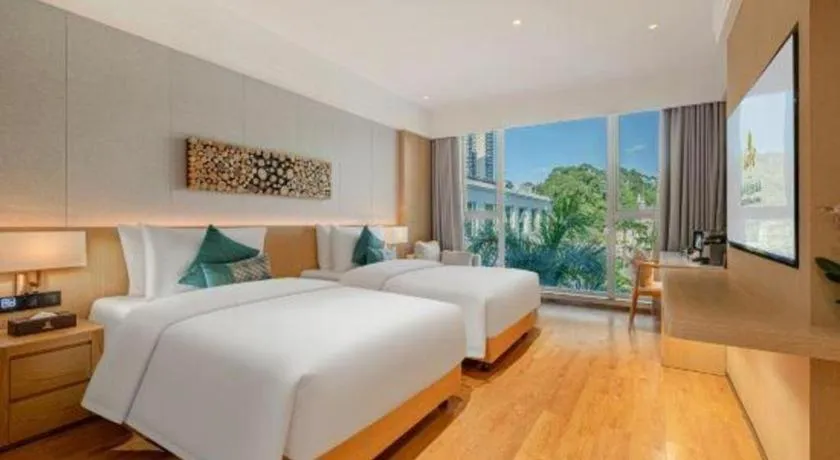 Bed in Dongguan Castfast Hotel