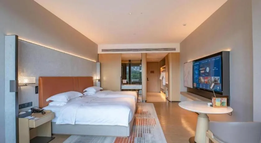 Bed in Dongguan Castfast Hotel