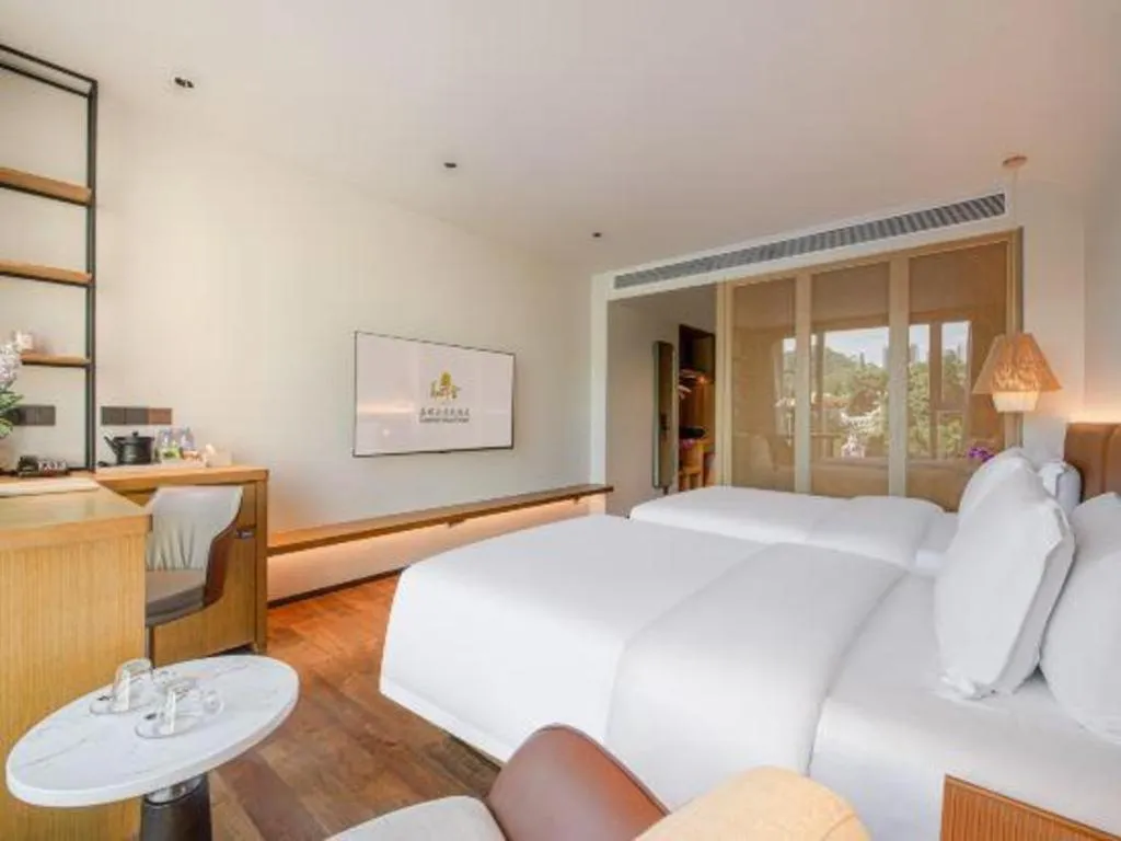 Bed in Dongguan Castfast Hotel