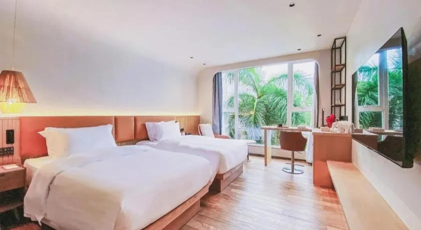 Bed in Dongguan Castfast Hotel