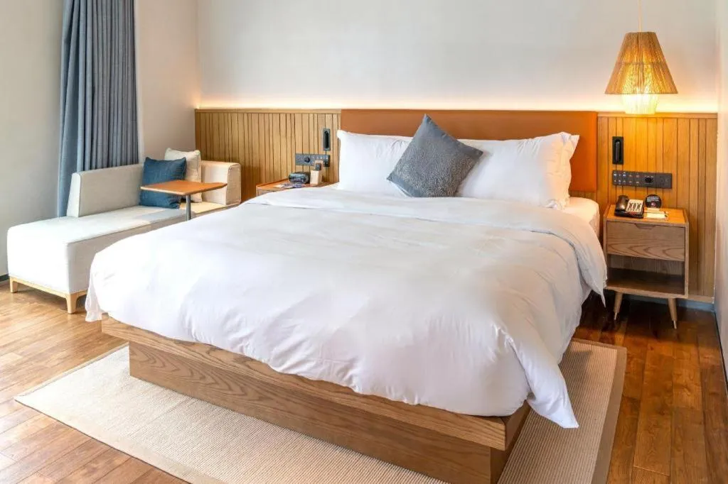 Bed in Dongguan Castfast Hotel