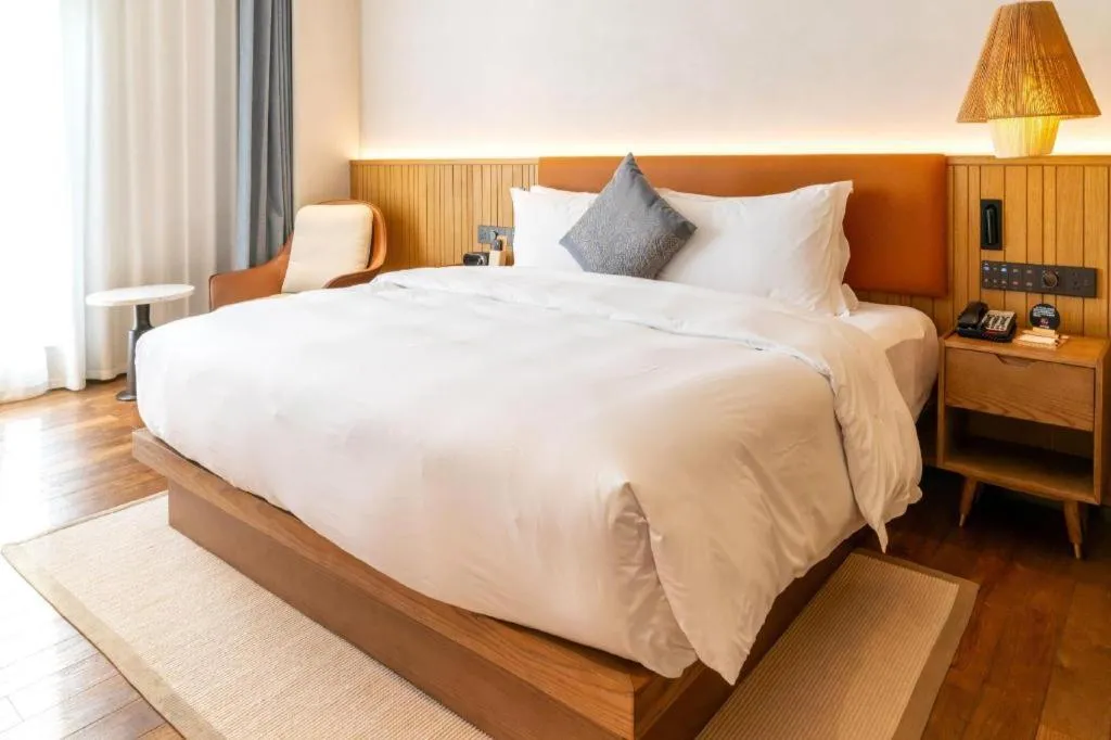 Bed in Dongguan Castfast Hotel